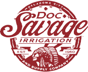 Doc Savage Irrigation and Supply round logo with Indian in lower half in brick red color